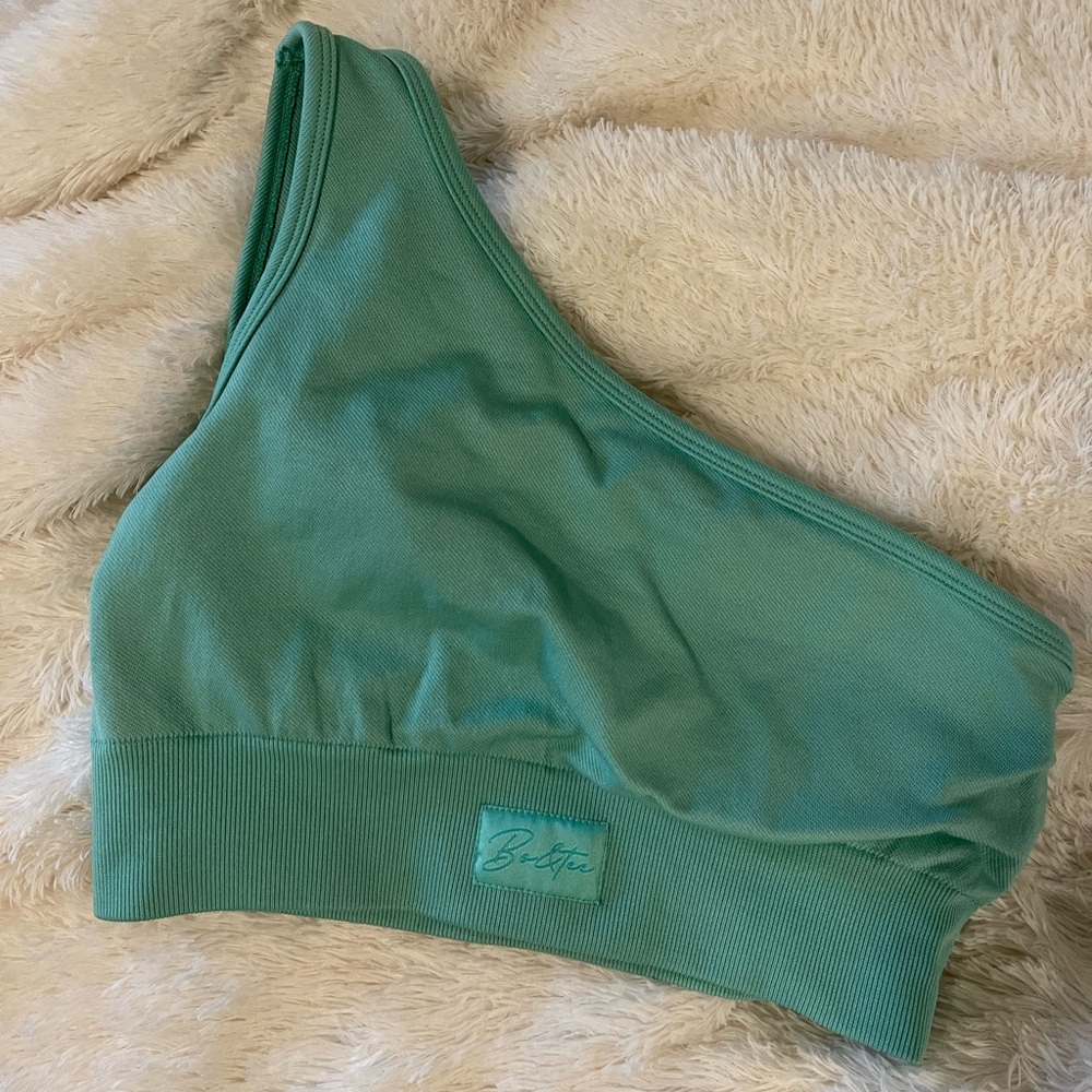 One shoulder Bo + Tee teal sports bra